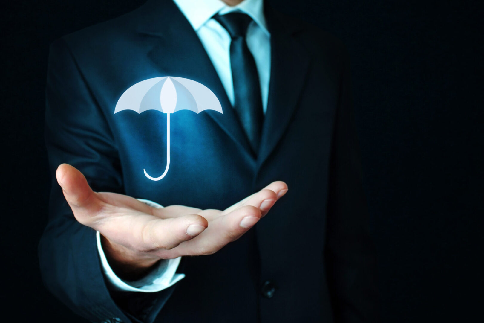 Man holding umbrella. Protection concept.