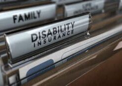 File with focus on the text Disability Insurance and blur effect. Concept of individual protection.